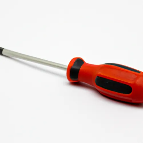 The first picture shows a red screwdriver with a black handle, laying on a wooden workbench. The screwdriver has a flat head, perfect for tightening or loosening screws in various projects.
