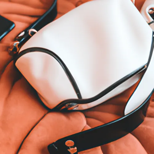 The YSL camera bag features multiple compartments and pockets for organizing your camera gear and personal items. This makes it easy to keep everything organized and easily accessible while on the move. The bag's compact size also makes it ideal for traveling, allowing you to carry your camera equipment securely while on the go.